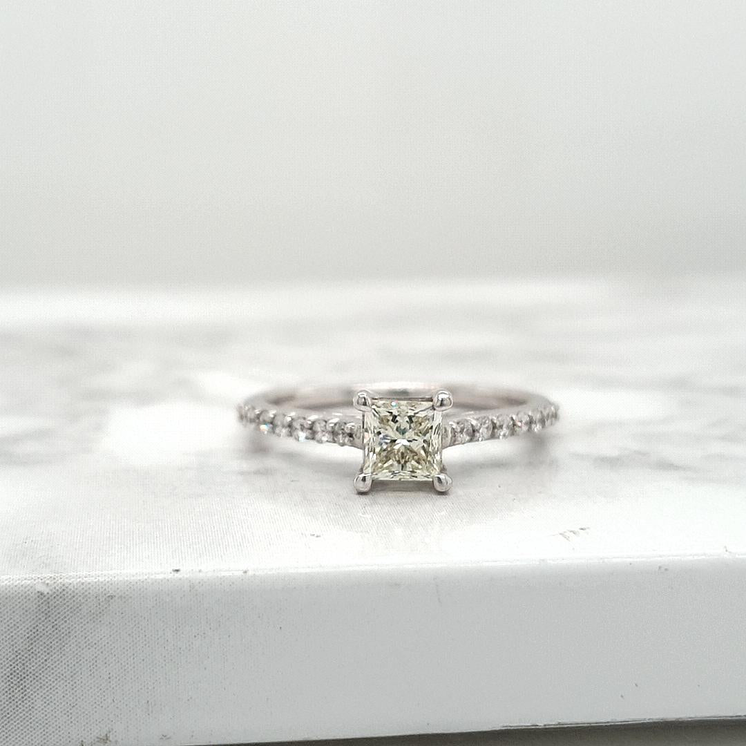 18ct white gold Princess cut Diamond Solitaire Ring with shoulder diamonds