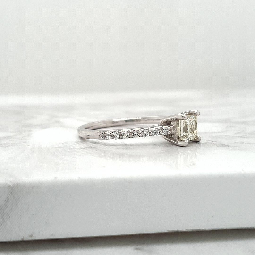 18ct white gold Princess cut Diamond Solitaire Ring with shoulder diamonds