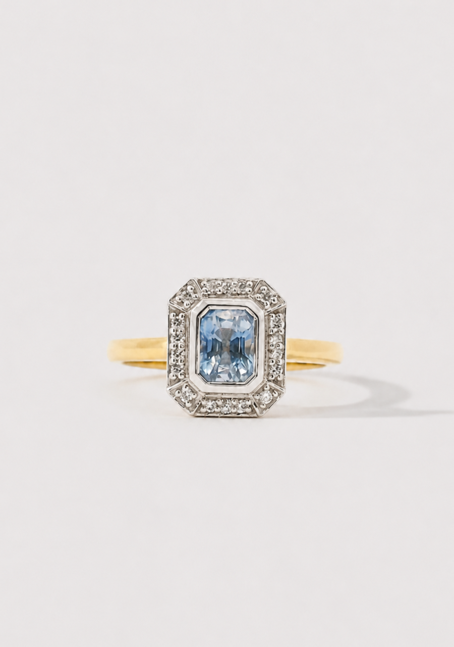 Sapphire & Diamond 18ct Yellow Gold 1.10ct Emerald Cut Ceylonese Sapphire & 0.08ct Round Brilliant Diamond Cluster Ring