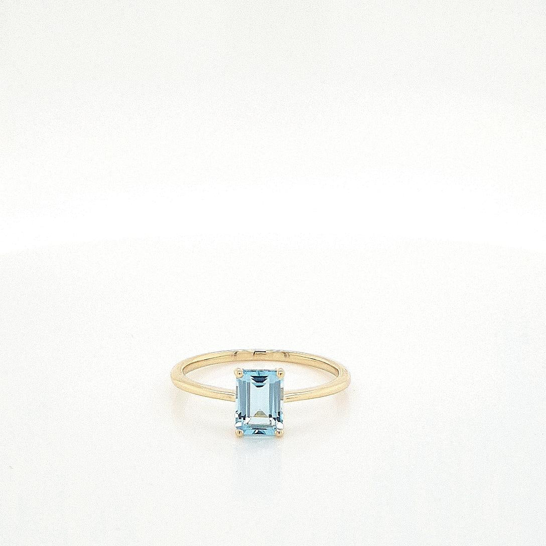 Blue Topaz 9k Yellow Gold Emerald Cut Ring
