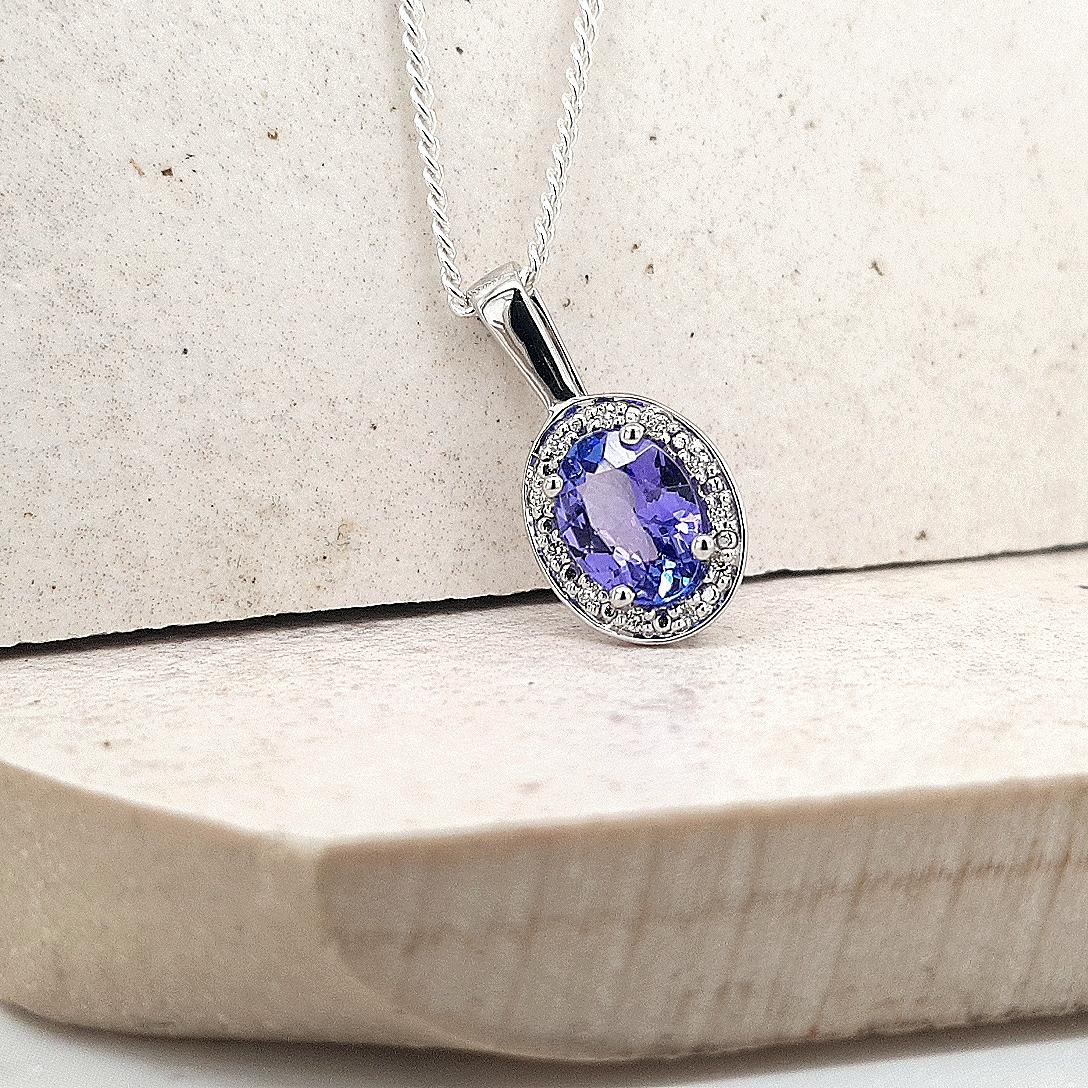 Tanzanite & Diamond 9ct White Gold Halo Pendant