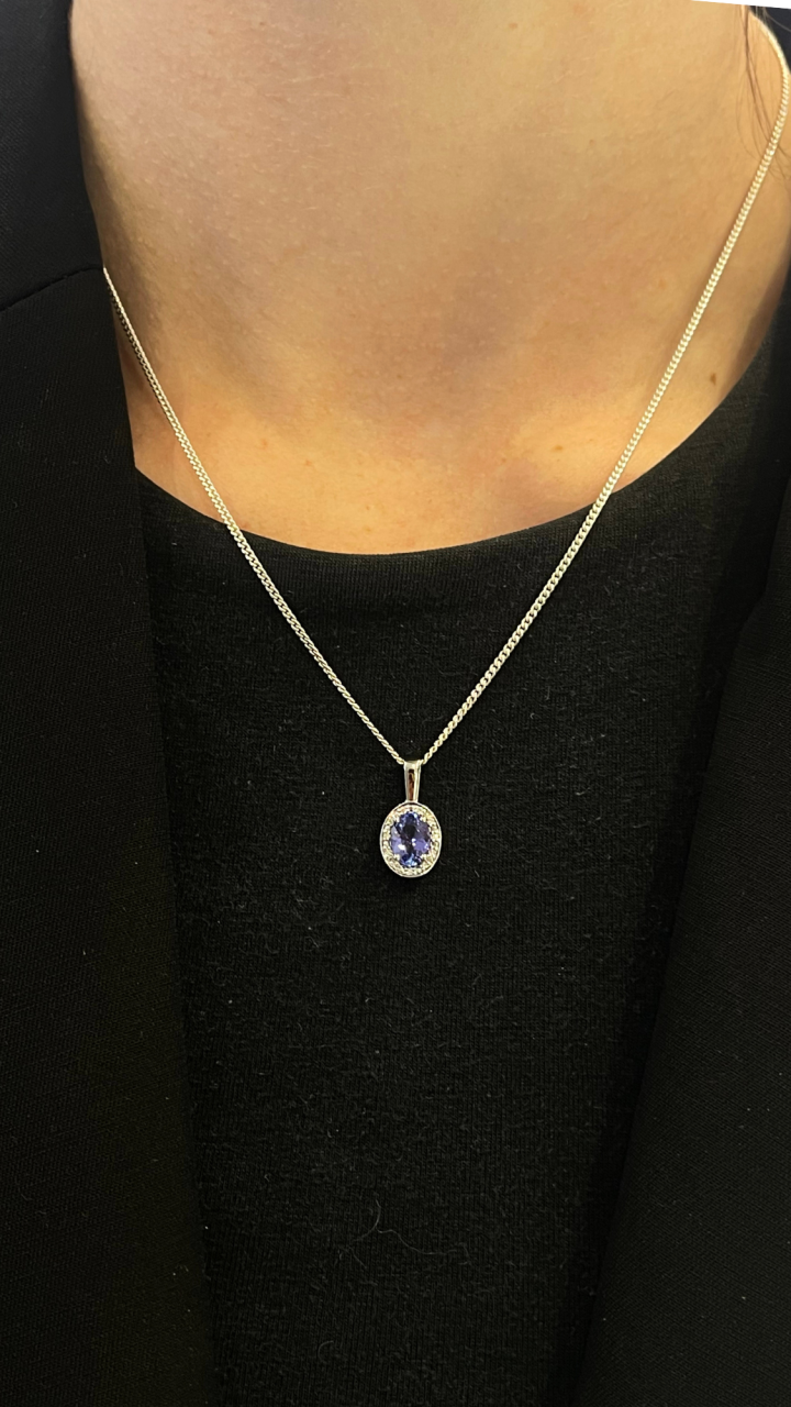 Tanzanite & Diamond Halo Pendant in 9ct White Gold