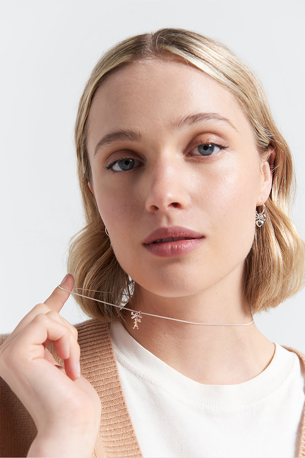 Karen Walker Sterling Silver Mini Girl with a Bow Necklace