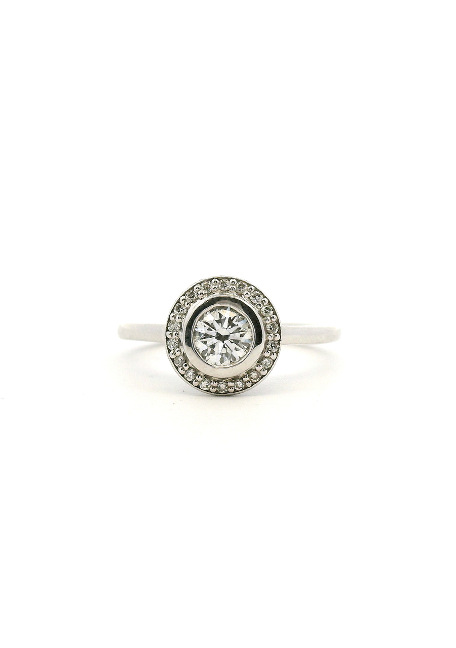 18ct White Gold Round Brilliant Bezel Set Diamond with Accent Round Brilliant Diamond Halo Ring