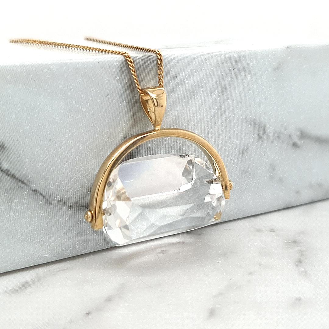 Clear Quartz 9k Yellow Gold Spinner Pendant