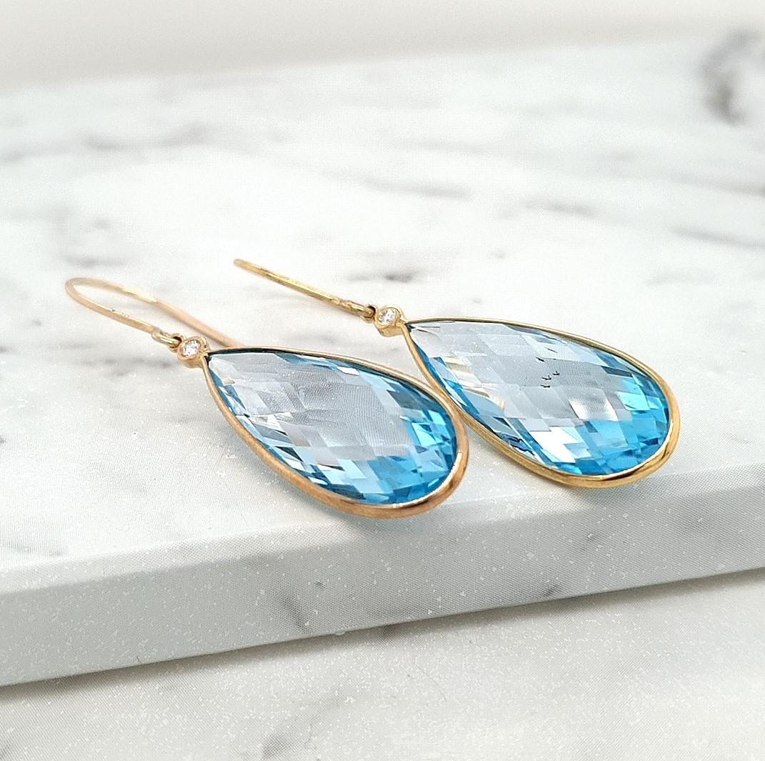 Blue Topaz 9k Yellow Gold Tear Drop Bezel Set Hook Earrings