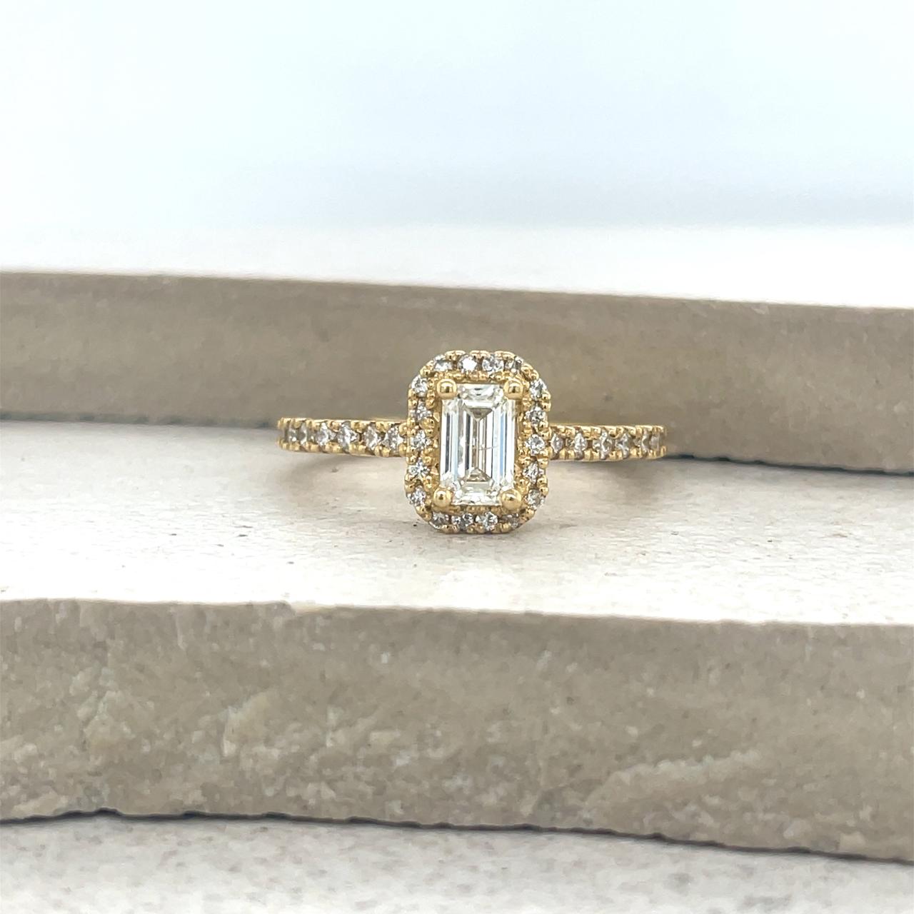 18ct Yellow Gold 0.50ct Emerald Cut Diamond Halo Ring