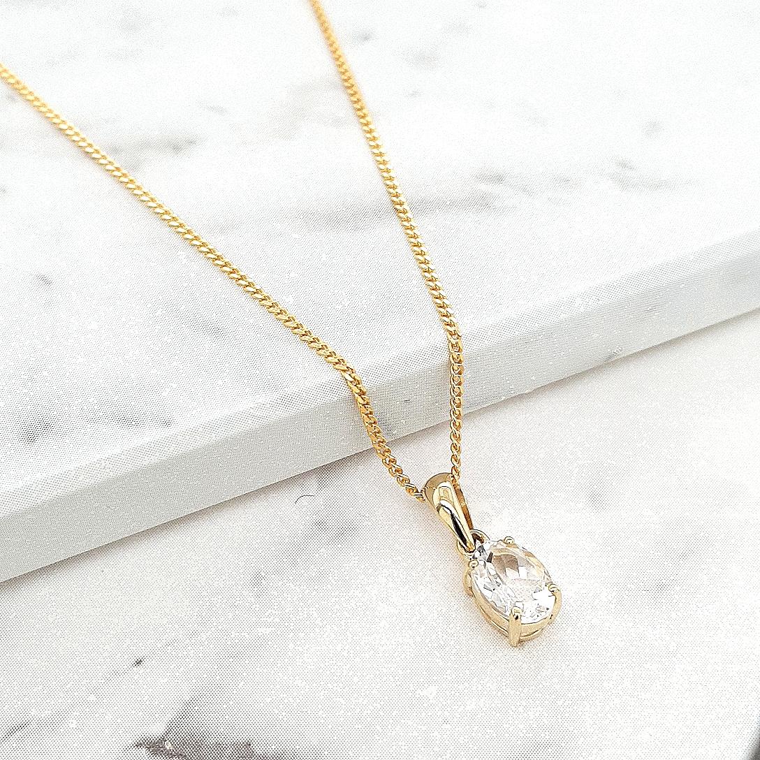 Clear Quartz 9k Yellow Gold Oval Pendant