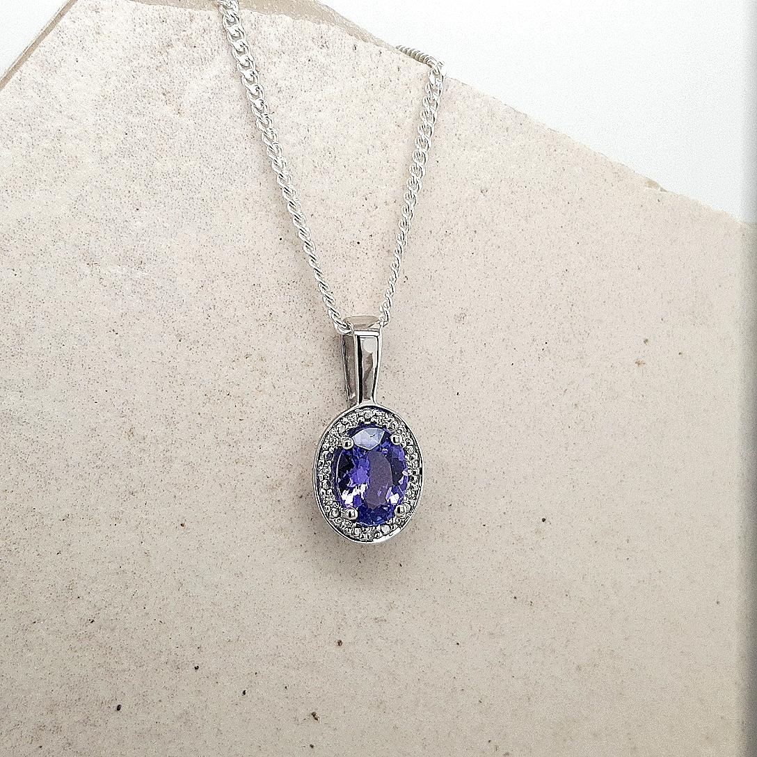 Tanzanite & Diamond 9ct White Gold Halo Pendant