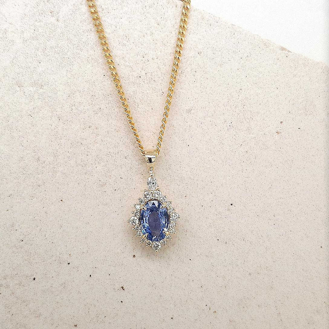 Ceylonese Sapphire & Diamond 9ct Yellow Gold Halo Pendant