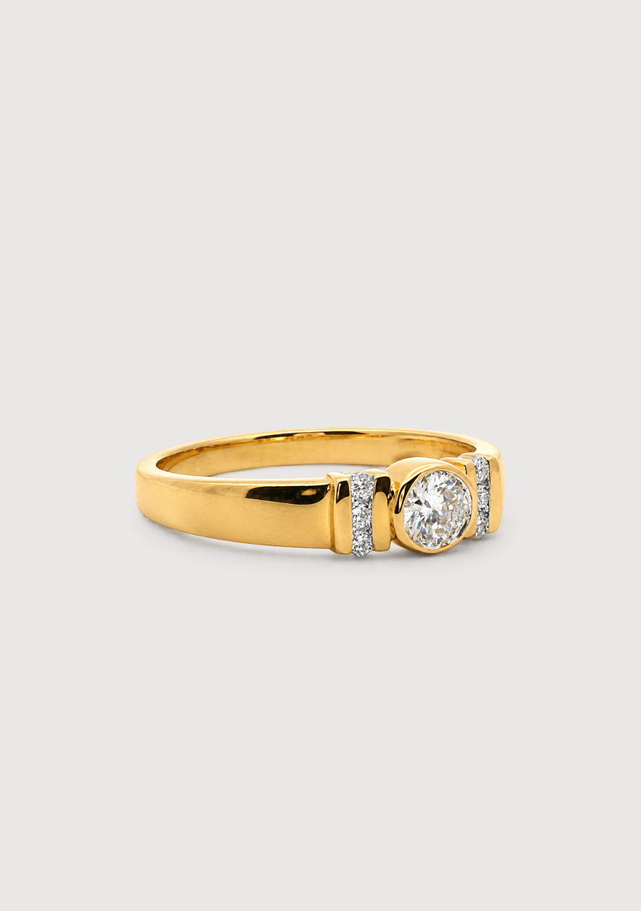 9ct Yellow Gold Diamond Bezel Set Ring with Accent Diamonds